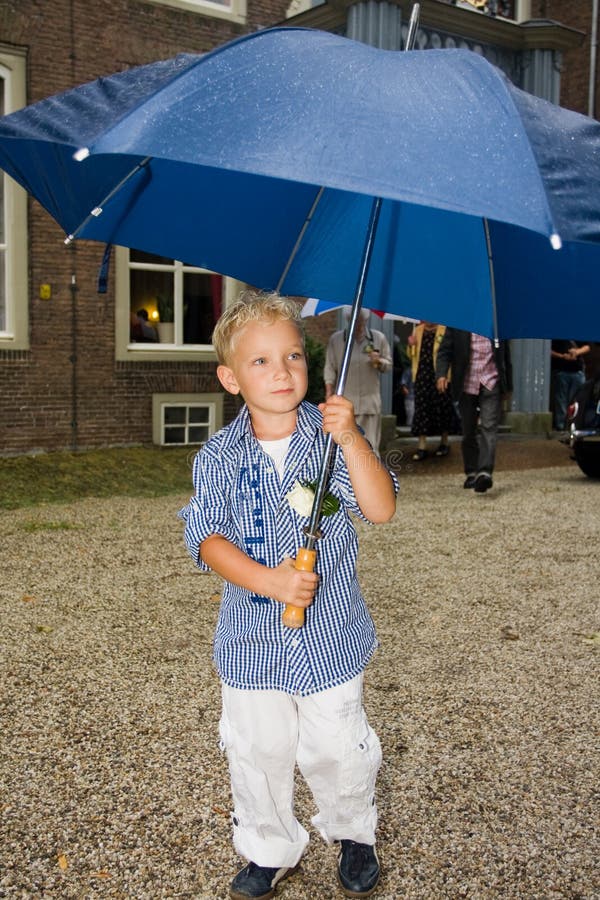 Boy with umbrella stock photo. Image of mother, rain, colorful 6161226