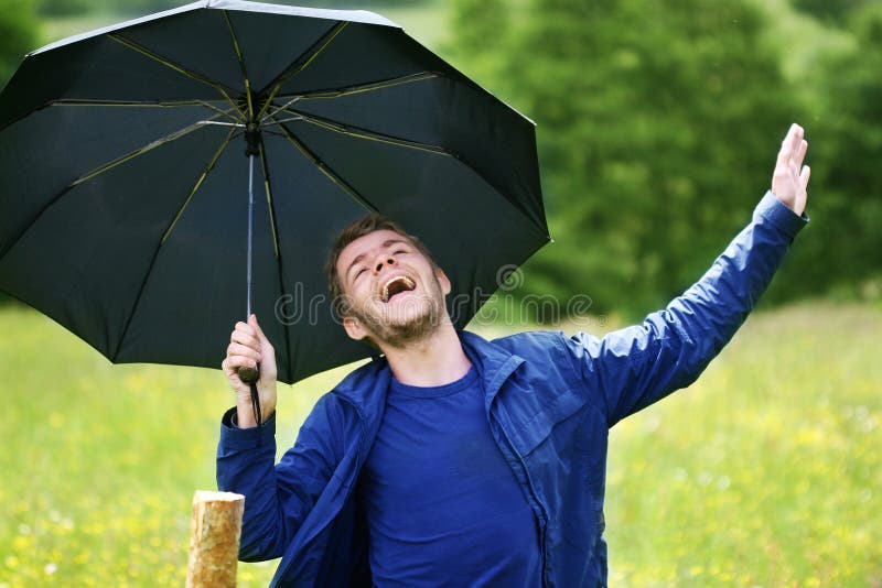 A boy with umbrella stock image. Image of grass, outdoor 8980031