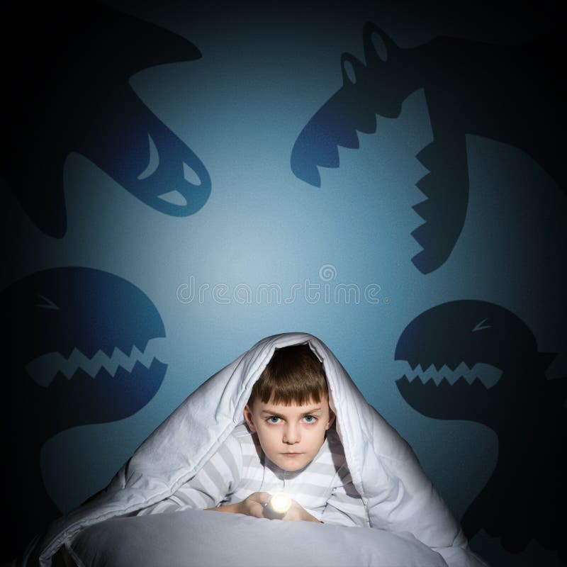 Boy Under the Covers with a Flashlight Stock Photo Image of bedtime