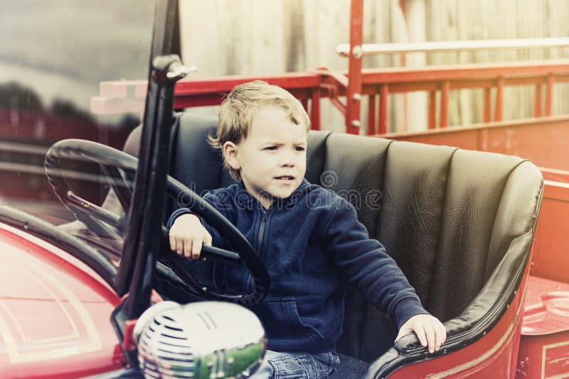 Boy in a Vintage Fire Truck - Retro