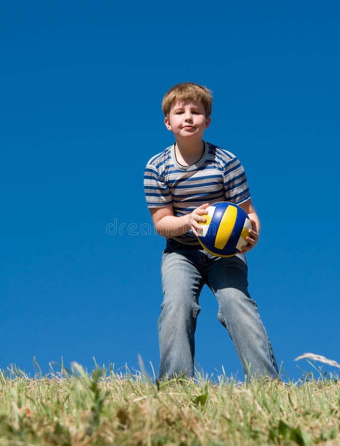 Boy with volleyball ball