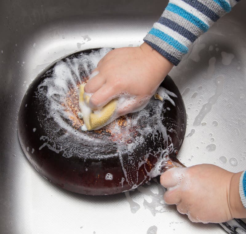 Boy Washing Dishes in the Kitchen Stock Photo Image of wash, sink