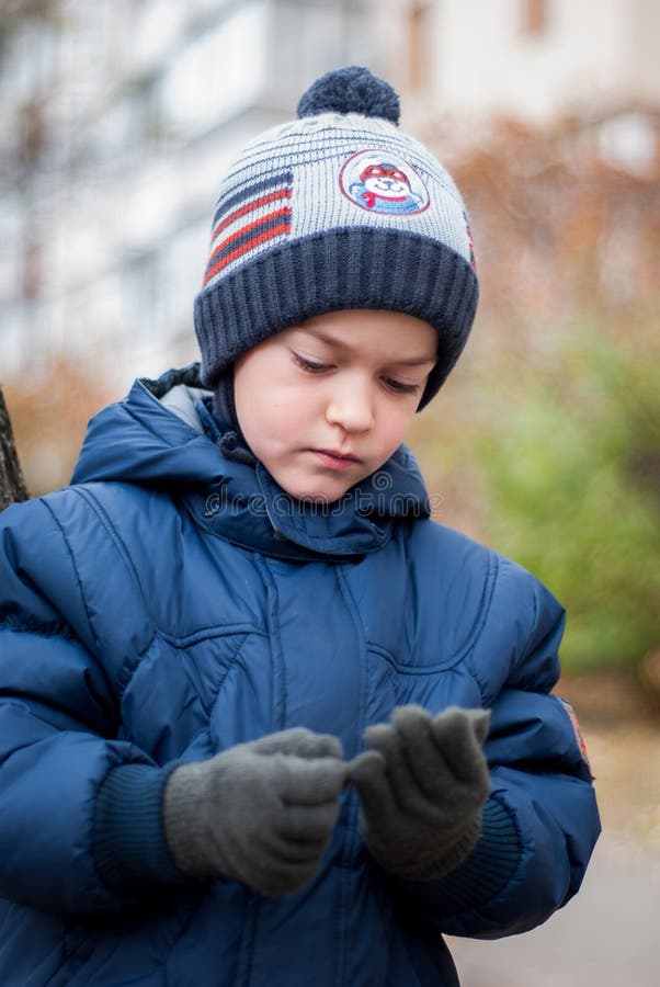 Boy wear gloves stock image. Image of black, white, learn 48519695