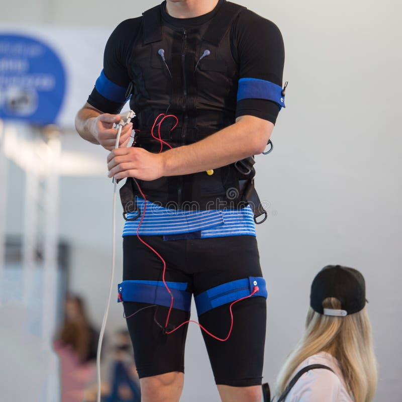 Boy Wearing Black Jacket with Electrode Muscular Electrostimulation