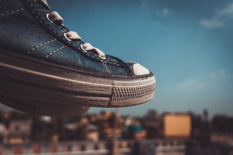 Boy Wearing a Converse Show . Stock Photo Image of show, brown 209858722