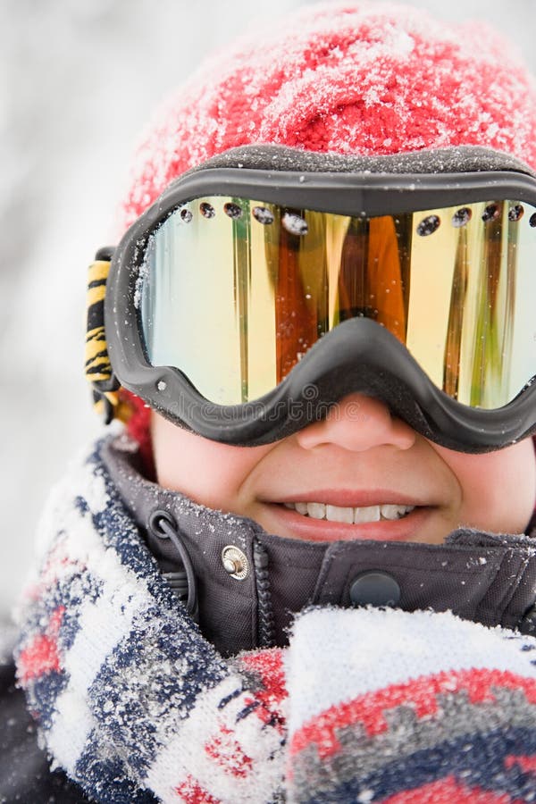 Boy wearing ski goggles