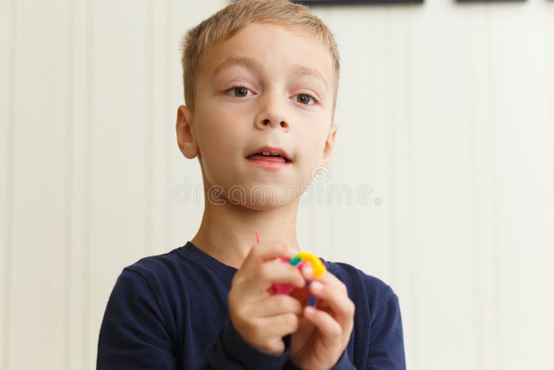 Boy Weaves Bracelet of Rubber Rings Stock Photo Image of learns, colorful 159684250