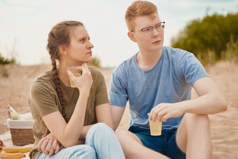 The boy looks tenderly at girl and wants to kiss. Concept of teenage love  and first kiss 7542624 Stock Photo at Vecteezy