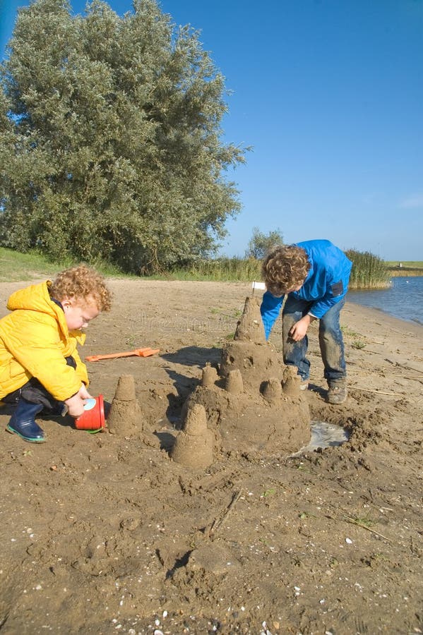 Boys Building Sandcastle