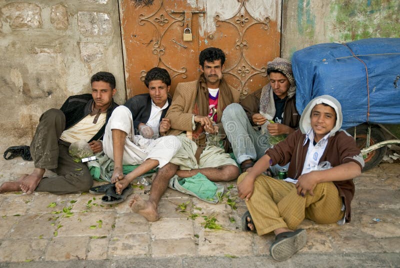 Boys chewing street qat khat sanaa city yemen