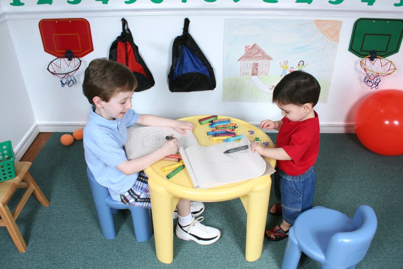 Boys Coloring at Preschool royalty free stock photography Boys Coloring at Preschool royalty free stock photography