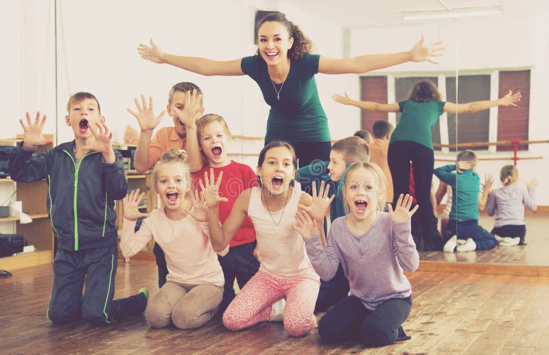 Boys and girls posing stock photos