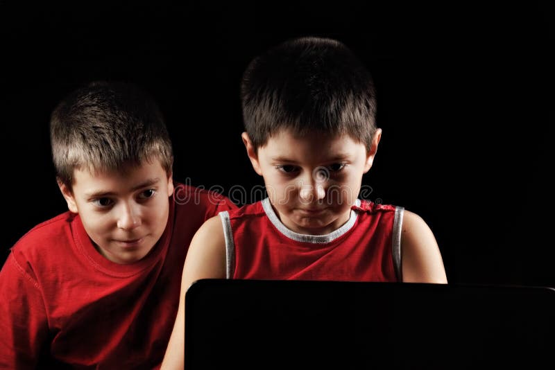 Boys at laptop royalty free stock photo