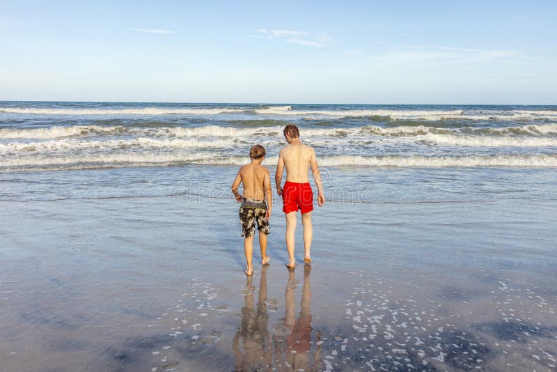 Boys relaxing at the beach