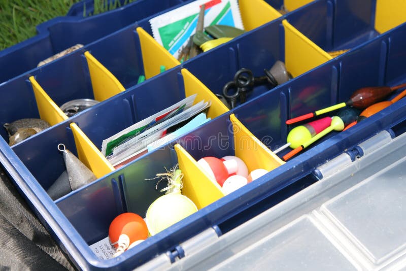 Box filled with small fishing necessities. Box filled with small fishing necessities