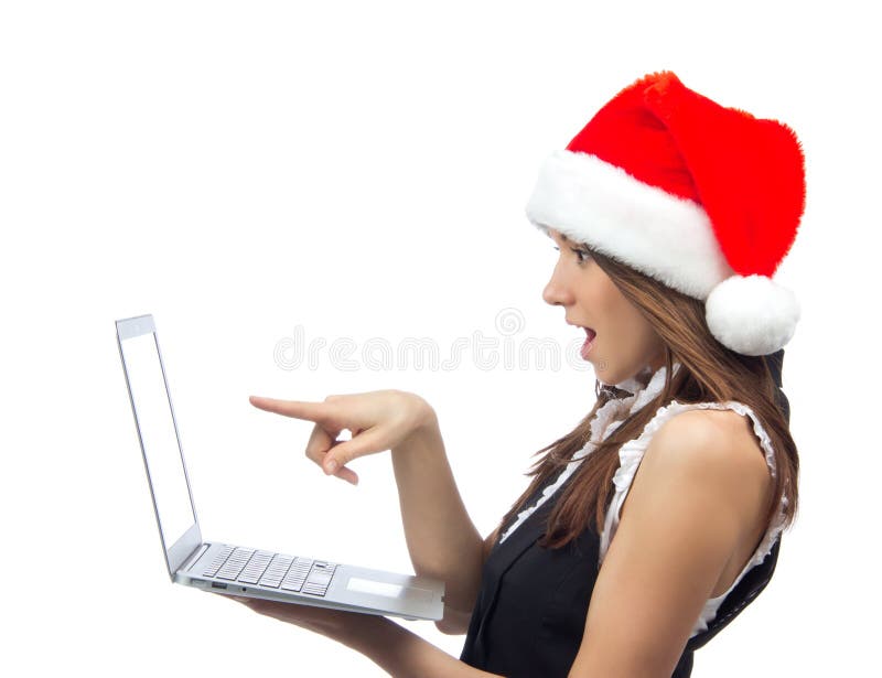 Bożenarodzeniowa kobieta z laptopu notatnikiem w Santa kapeluszu fotografia royalty free Bożenarodzeniowa kobieta z laptopu notatnikiem w Santa kapeluszu fotografia royalty free