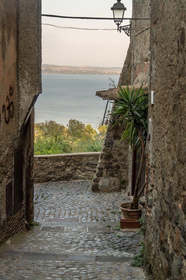 Bracciano, Lazio, Italy. Bracciano, Italy - July 31, 2018: Streets of Bracciano, small town in the region of Lazio famous for its volcanic lake stock image Bracciano, Lazio, Italy. Bracciano, Italy - July 31, 2018: Streets of Bracciano, small town in the region of Lazio famous for its volcanic lake stock image