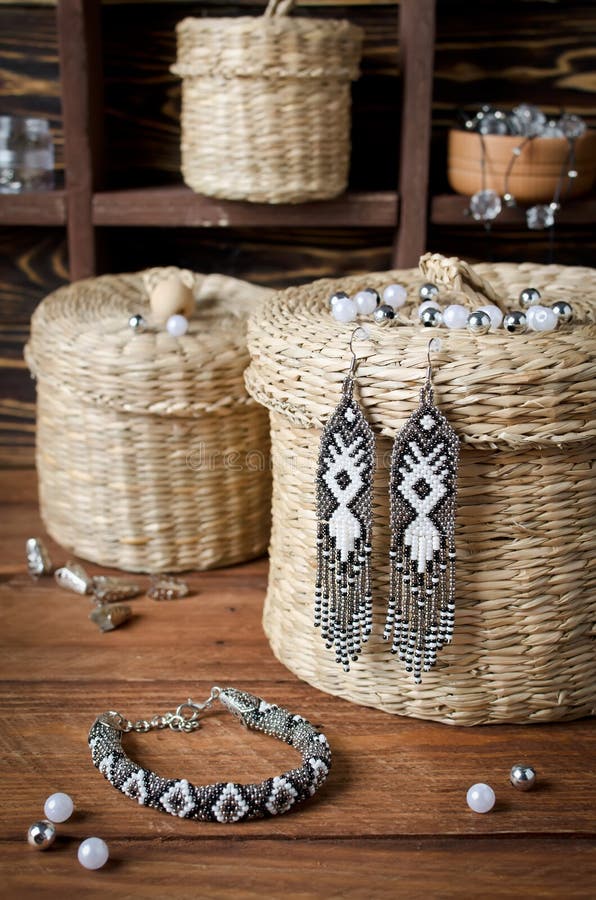 Bracelet Made of Small Beads in a Set with Handmade Earrings Stock