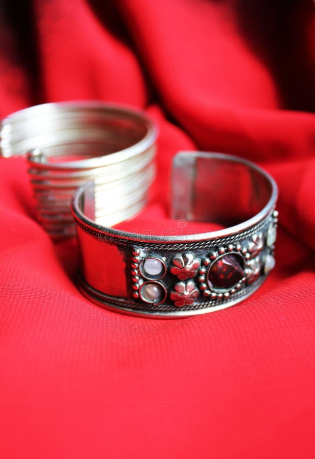 Bracelet on a red silk background