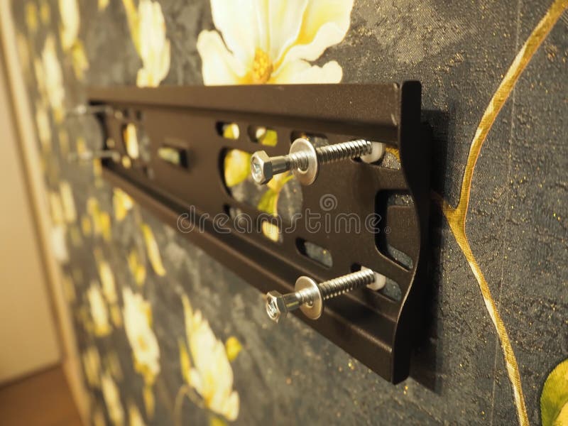 Bracket for mounting TV installation for plasma televisions. stock photography.