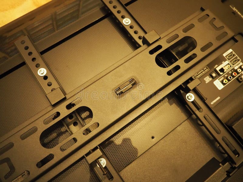 Bracket for mounting TV installation for plasma televisions. stock photos.