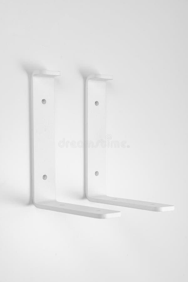 Bracket on a White Background. Support Part for Mounting Shelves. Stock