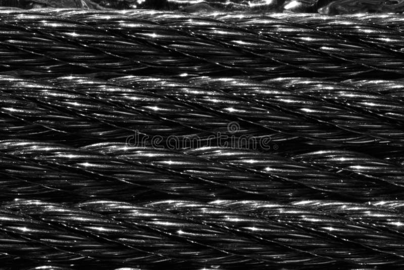 Braided metal cable closeup stock photo