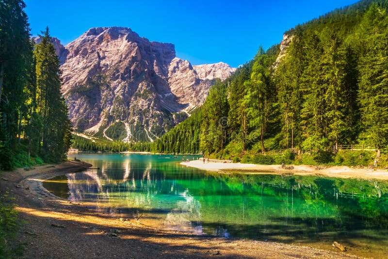 Braies or Prags lake or Pragser Wildsee and Dolomites mountains. Trentino Alto Adige Sud Tyrol, Italy, Europe. Braies or Prags lake or Pragser Wildsee and Dolomites mountains. Trentino Alto Adige Sud Tyrol, Italy, Europe.