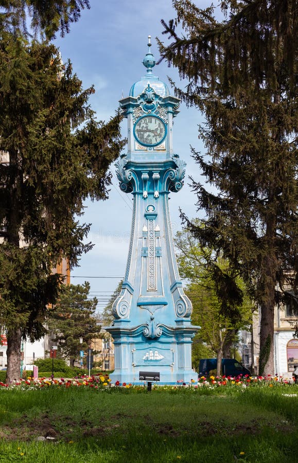 Braila, Romania-May 1, 2021: Front photo with the public clock from Braila, the blue clock on the Danube, a historical monument that was installed in 1909. Braila, Romania-May 1, 2021: Front photo with the public clock from Braila, the blue clock on the Danube, a historical monument that was installed in 1909.