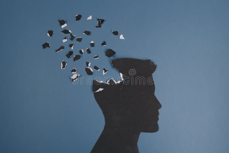 Brain disorder symbol presented by human head made form paper . Creative idea for Alzheimer`s disease, dementia, memory
