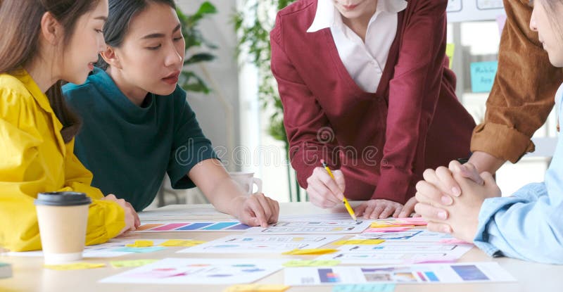 Brainstorm planing creative teamwork, Close up of hands mobile phone app developer team meeting about screen display prototype royalty free stock images.