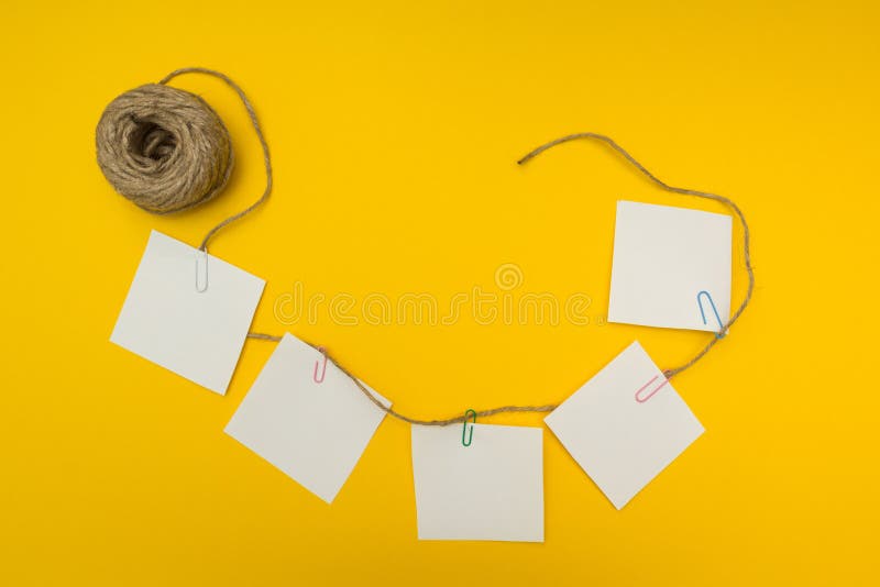 Brainstorm strategy workshop business note notes sticky, yellow background. flat composition stock photo