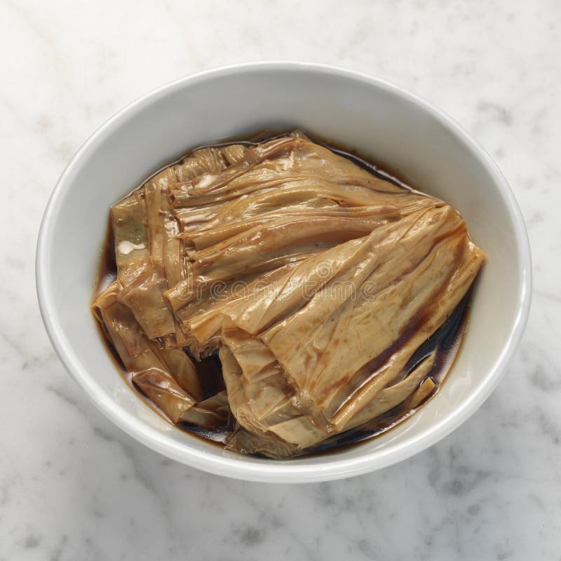 Braised bean curd in soya sauce. Traditional side dish in singapore and malaysia for bak kut teh, pork rib soup stock photos Braised bean curd in soya sauce. Traditional side dish in singapore and malaysia for bak kut teh, pork rib soup stock photos