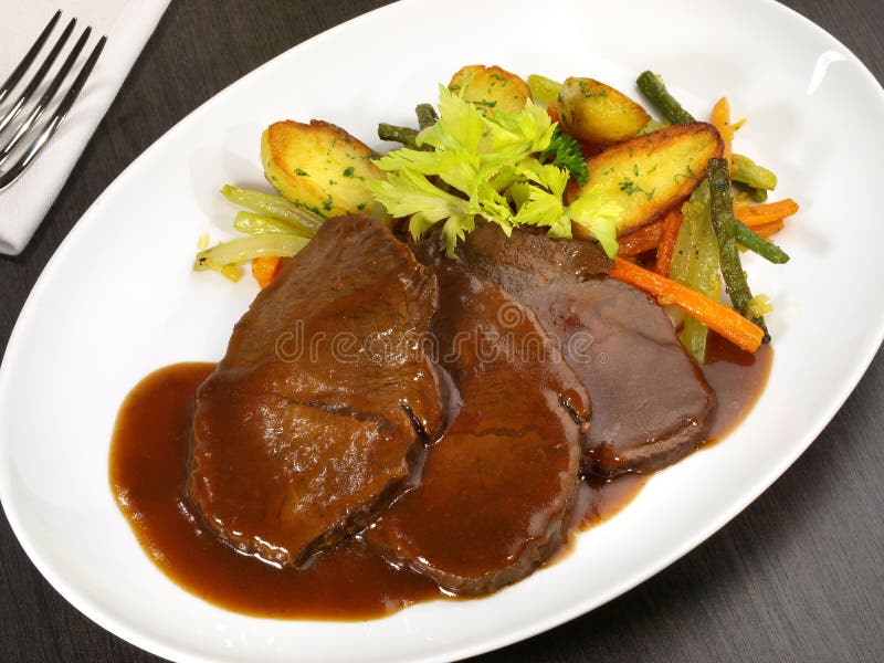 Fine Meat - Braised Beef Roast with Vegetables and Potato Wedges Stock
