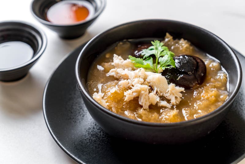 Braised Fish Maw in Red Gravy Soup with Crab Stock Photo Image of