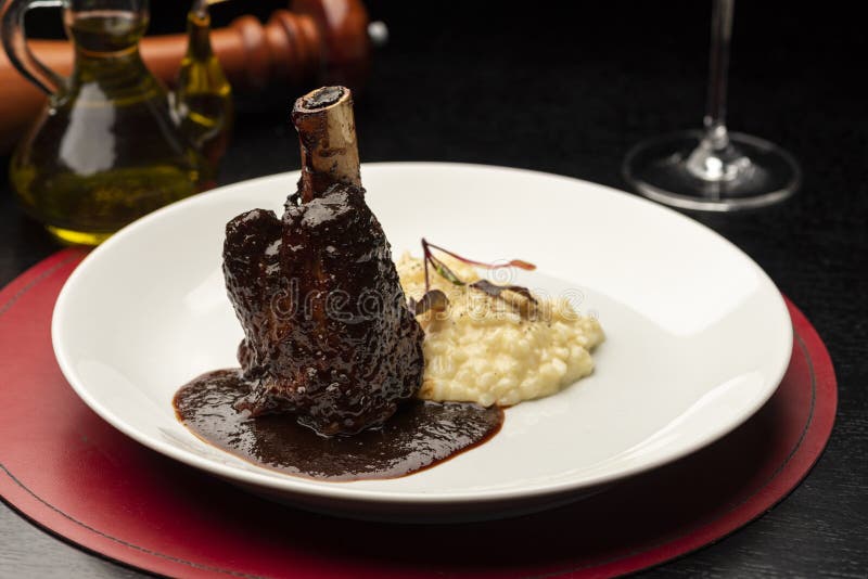 Braised Lamb Shanks, Stinco di agnello vitello brasato with sauce and risotto