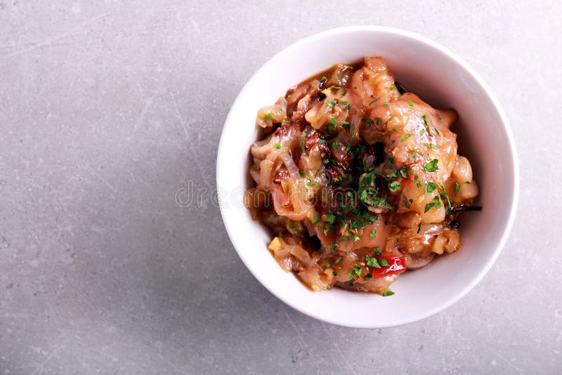 Pork Feet on Display for Sale at Local Meet Market. Stack of Butchered