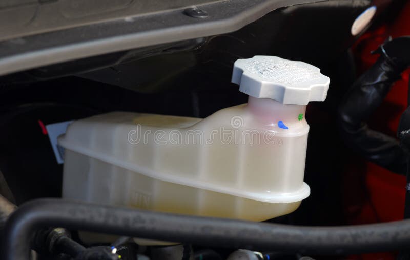 Brake fluid bottle stock photo. Image of service, hood 43705146