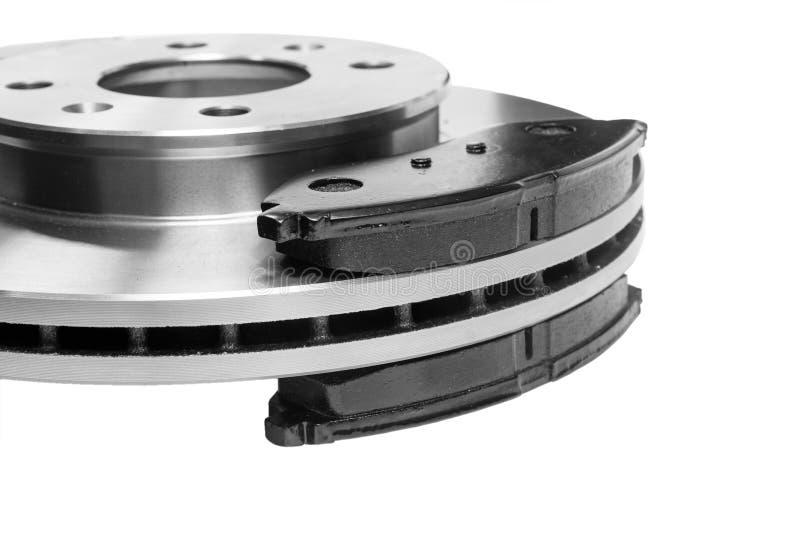 Old Brake Pads on the Brake Disc with a Shallow Depth of Field Stock