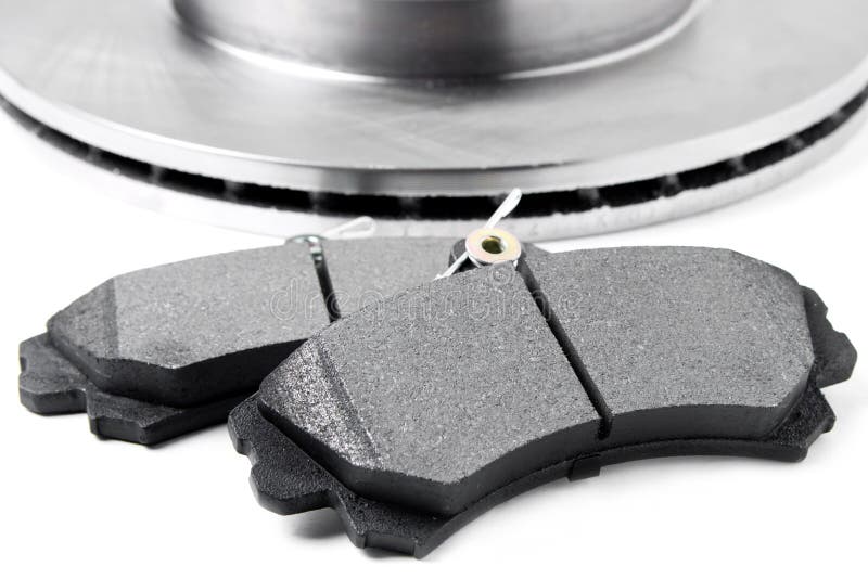Brake pads and brake discs on white background. Auto parts stock images Brake pads and brake discs on white background. Auto parts stock images