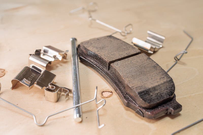 Brake Replacement Kit Showing Brake Pads, Caliper Pins, Shims, Wear Indicators, and Hardware royalty free stock images