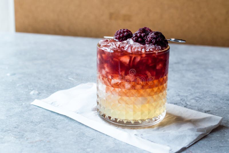 Bramble Cocktail with Blackberries and Crushed Ice. Stock Photo Image