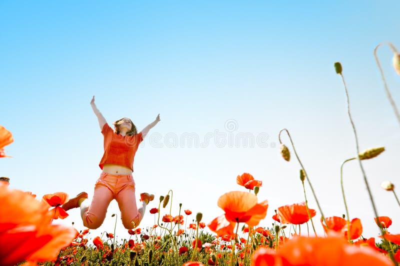 Fille sautant photographie stock