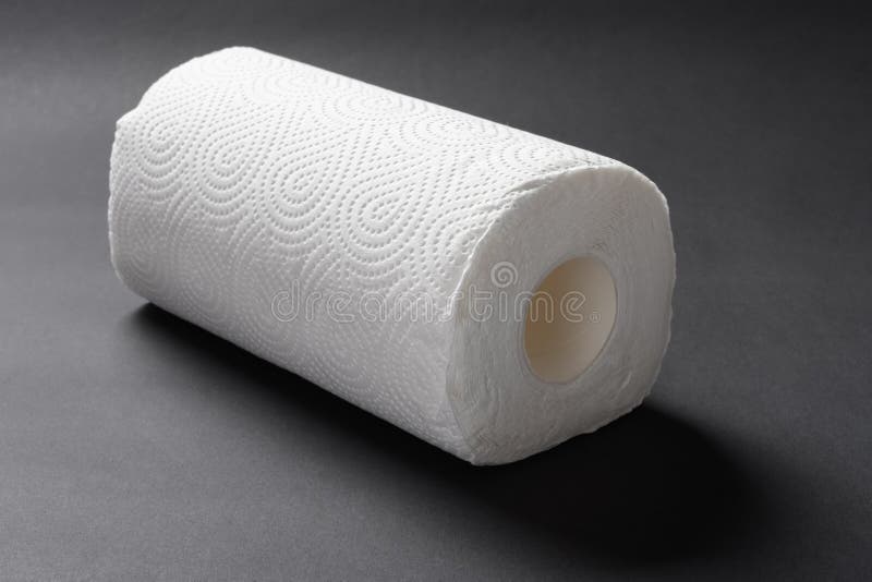 A Brand New Paper Roll for Kitchen on Black Background Stock Photo