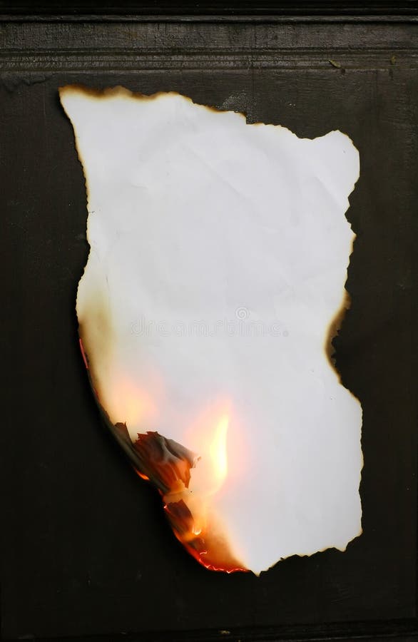 Brandend papier stock afbeelding