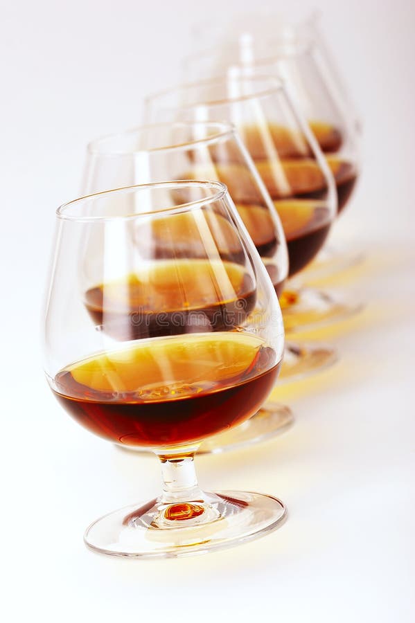 Brandy glass and bottle stock image. Image of hard, salute 530879