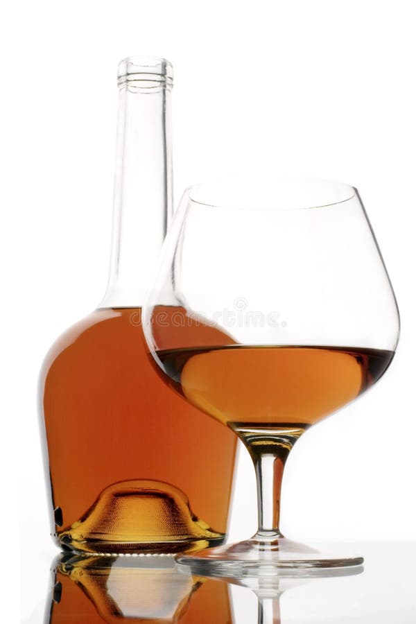 Brandy glass and bottle stock image. Image of hard, salute 530879