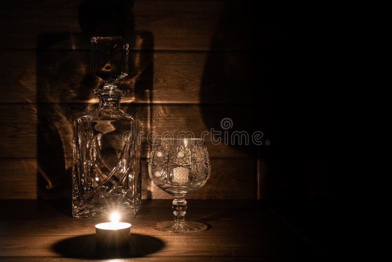 Brandy Glass and Bottle and Candle Stock Image Image of shade