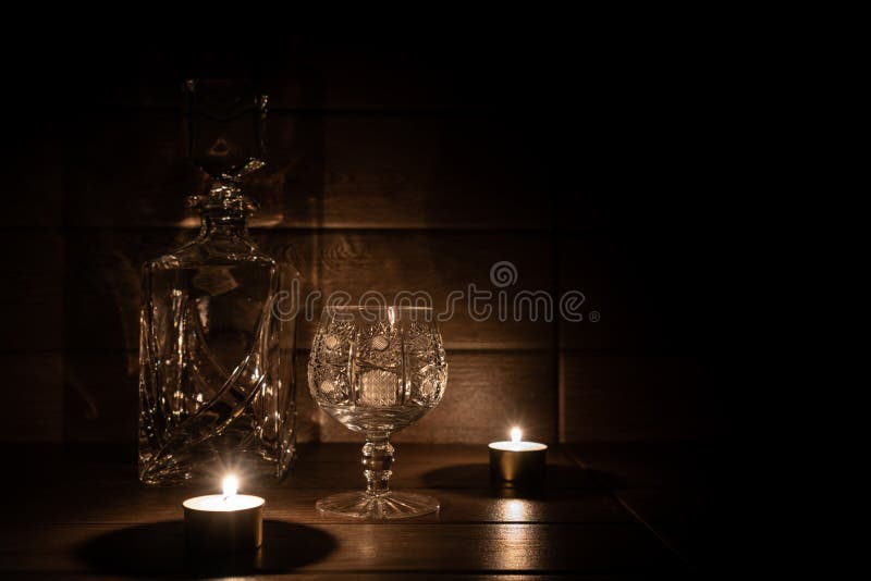 Brandy Glass and Bottle and Candle Stock Photo Image of luxury, light