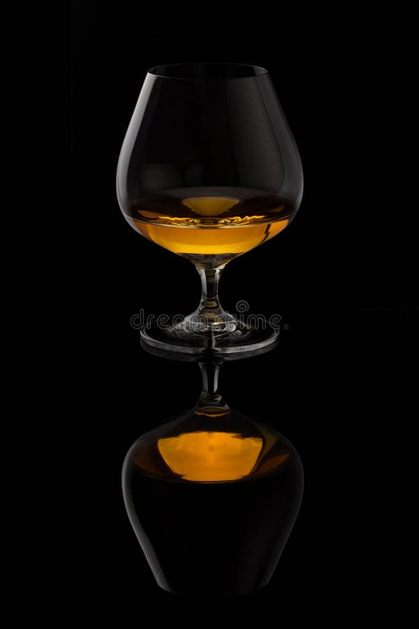 Brandy glass and bottle stock image. Image of hard, salute 530879